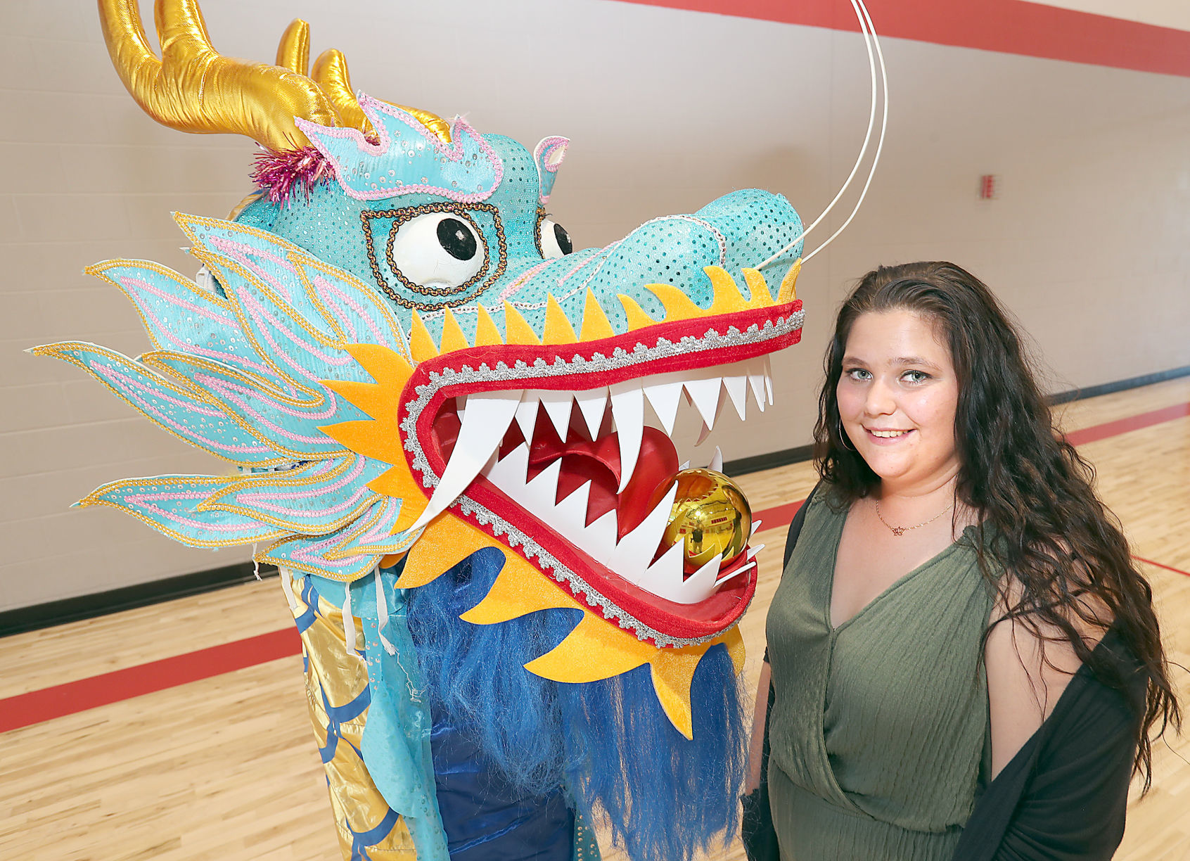 Big Blue Dragon Boat youth ambassador Vanessa Smith with dragon